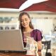 Woman On Phone Using Credit card